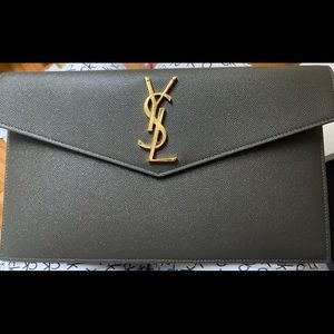 YSL Uptown Medium Clutch in the colour Pebble